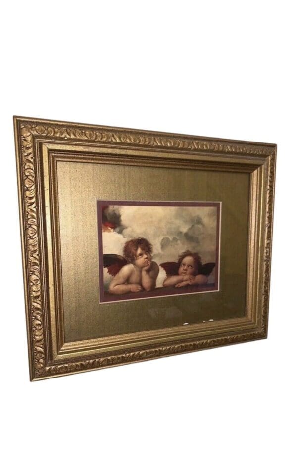 Framed painting of two cherubs.