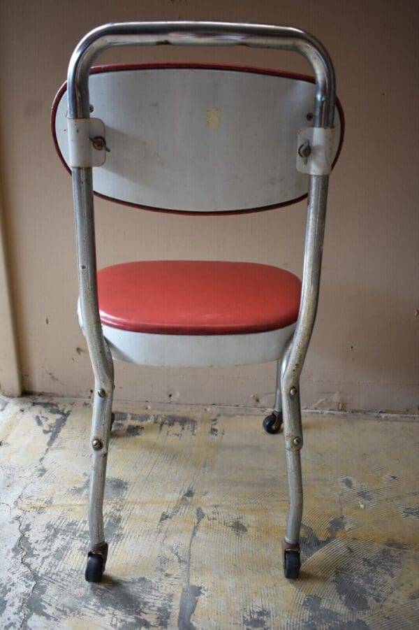 Mid Century Metal & Chrome Rolling Red Upholstered Chair