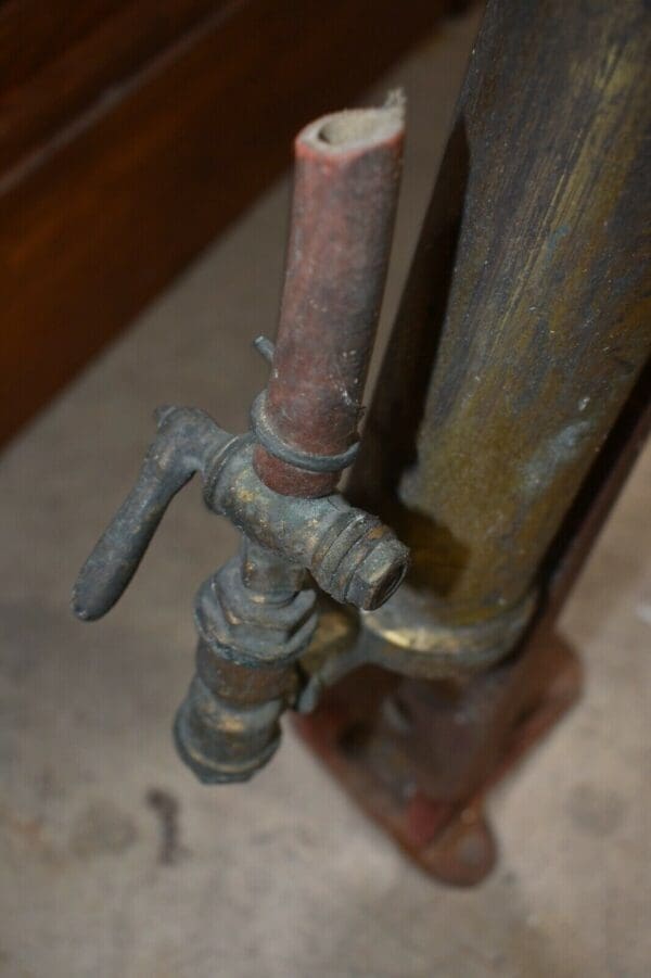 Antique Brass Hand pump keg tap by The Bishop and Babcock company