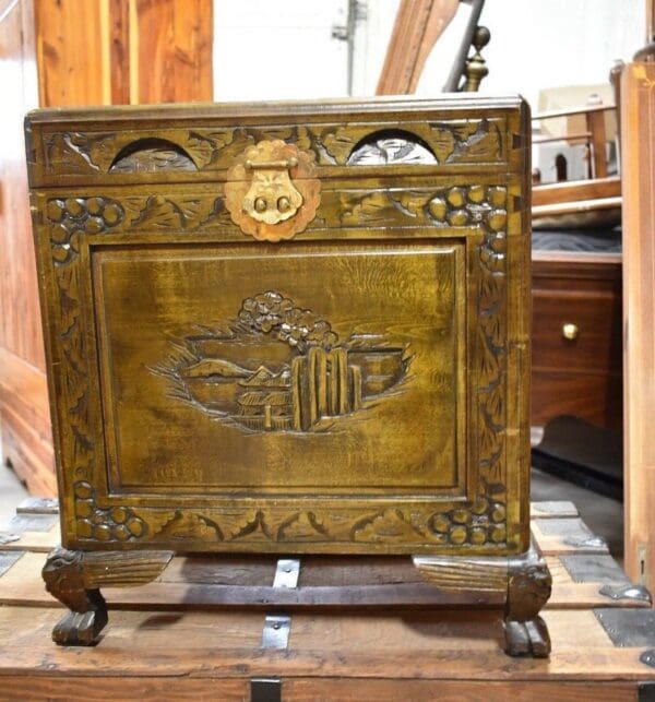 vintage Heavily carved asian inspired chest with claw feet