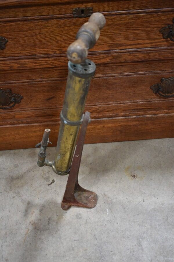 Antique Brass Hand pump keg tap by The Bishop and Babcock company