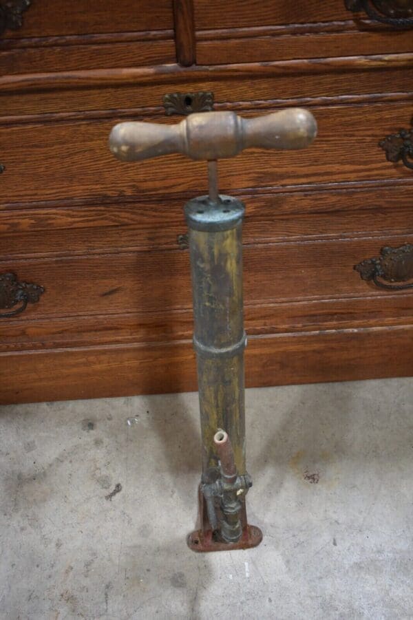 Antique Brass Hand pump keg tap by The Bishop and Babcock company