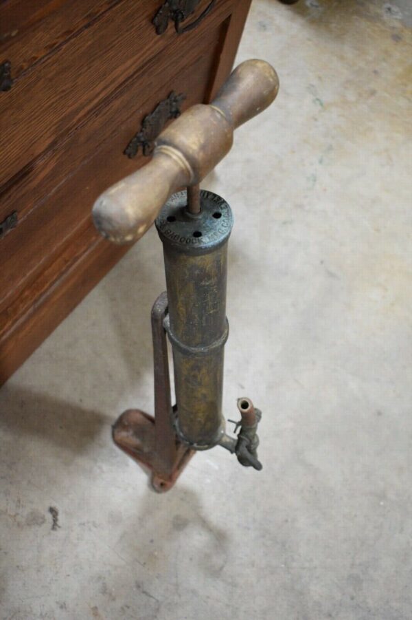 Antique Brass Hand pump keg tap by The Bishop and Babcock company