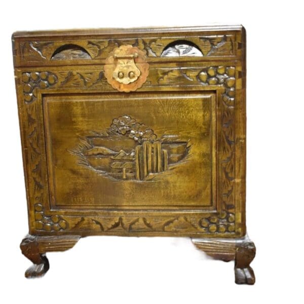 vintage Heavily carved asian inspired chest with claw feet