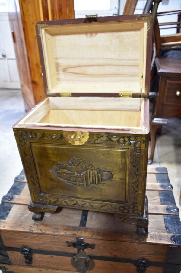 vintage Heavily carved asian inspired chest with claw feet