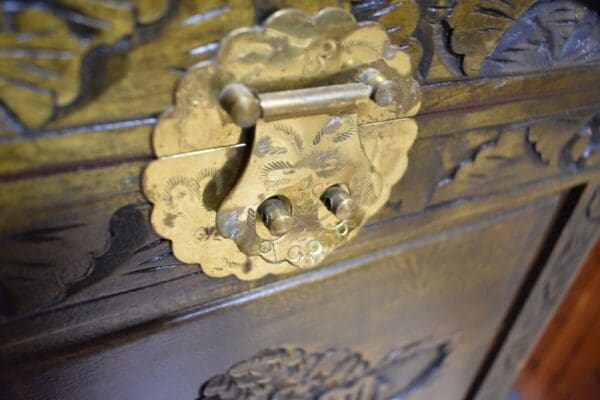 vintage Heavily carved asian inspired chest with claw feet