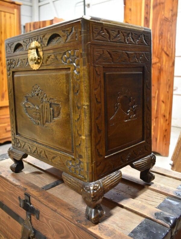 vintage Heavily carved asian inspired chest with claw feet