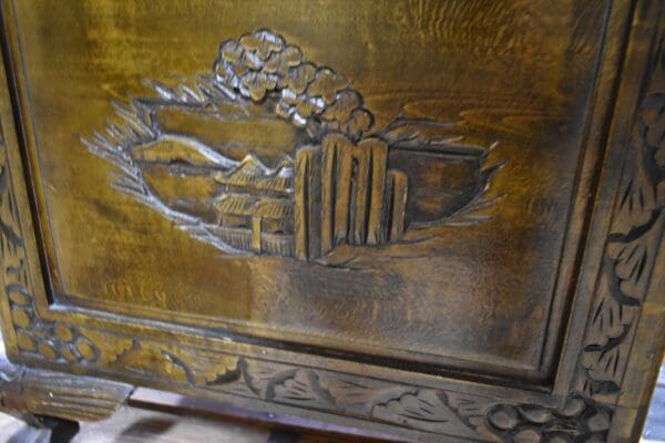 vintage Heavily carved asian inspired chest with claw feet