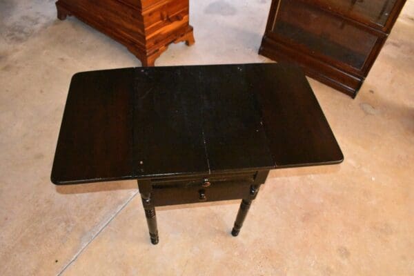 Antique Empire Style Drop Sides Table with Turned Legs Dark Ebonized Finish