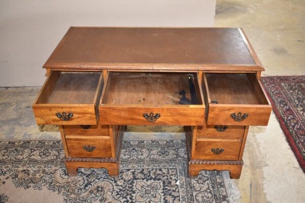 Antique Leather Top Kneehole Desk