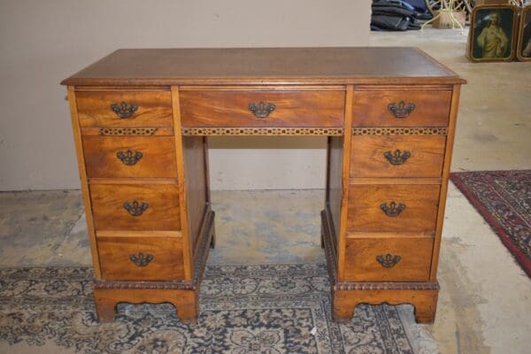 Antique Leather Top Kneehole Desk