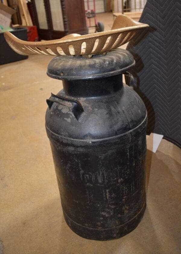 Antique Tractor Seat Chair on Vintage Metal Milk Can, Jamaica NY