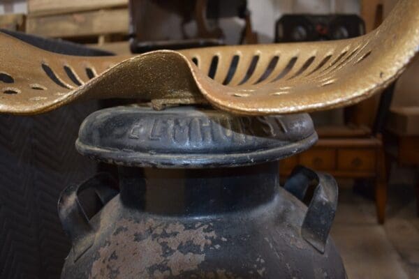 Antique Tractor Seat Chair on Vintage Metal Milk Can, Jamaica NY